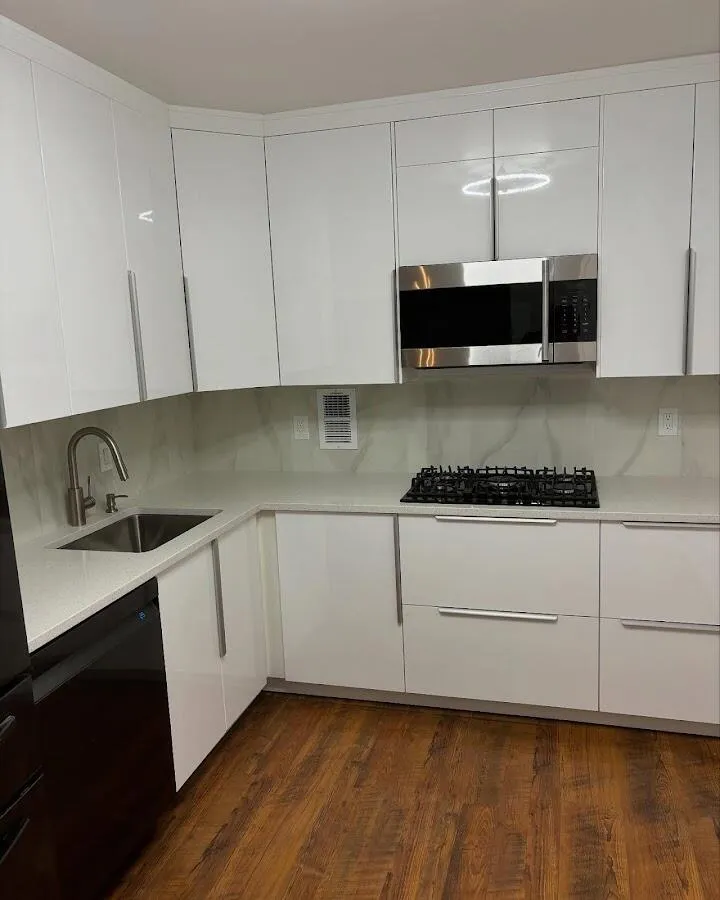Restored kitchen with white cabinets after water damage in North Smithfield